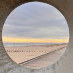 A porthole looking out to the gorgeous Dymchurch Beach